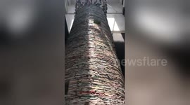 Textbooks weighing 14 tonnes built into 11-metre-high book tower in China's Xi'an