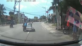 Motorcyclist in the Philippines somehow drops gas canister but swiftly shuts it off before explosion
