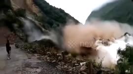 Colossal landslide sends huge waves crashing through reservoir in China's Leshan