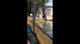 Locals at the Black River arguing over fish