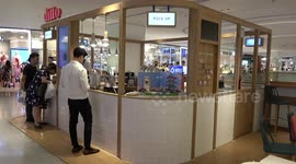 Barista shows how to make bubble tea with cute marshmallow pig on top