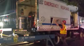 NYC Blackout: Emergency crew works on a darkened Broadway