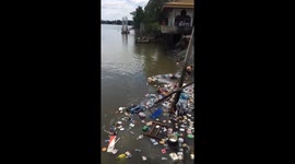 Four people missing and dozens injured after Thai temple collapses into river on first day of Buddhist Lent