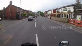 Driver applies make up at the wheel