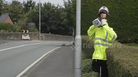 Bogus bobby: A scarecrow cop made of straw slows speeding drivers in England