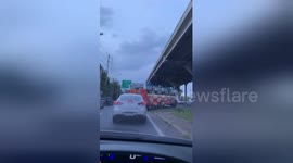 Newsflare Edit - Thailand bus driver scrambles off highway to hurry to bathroom
