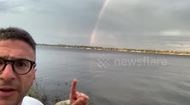 Dad mildly freaks out at perfect rainbow