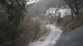 looe landslide where a lady was trapped in her house and died
