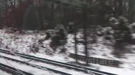 Snowy scenes from train window