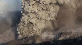 Dramatic closeup footage of Iceland volcano eruption filmed from crater rim