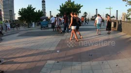 POV hyperlaspe shot along the beach in barcelona