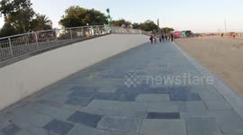 POV hyperlaspe shot along the beach in barcelona