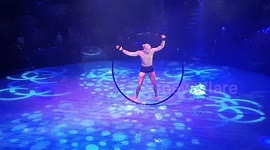 Hippodrome Spinning hoop in water dance