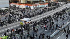 Ambulance through protesters crowd Hong Kong