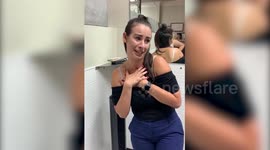 Pro-choice US woman has a COAT HANGER tattooed on her back to protest cuts to reproductive rights