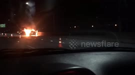Burning car around Santos/SP highway