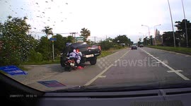 Three teenagers knocked off motorcycle on Thai road after pick-up truck cuts in front of them