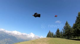 Wingsuit flyby in French Alps