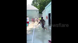 5’6 gymnast dives over 6’1 life guard