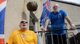 A pair of Rangers-daft pensioners have been told to take down flags outside their homes - because they might be deemed offensive
