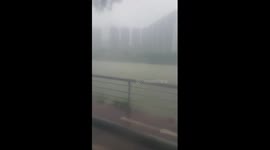 enjoying rain in typhoon 8 in shatin hong kong