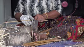 Basket weaving from start to finish a detailed look at how this ever diminishing arts and crafts skill is used to make rice baskets in rural Thailand.