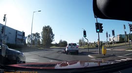Cyclist hits car pulling out on traffic junction