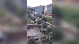 Coal factory and streets submerged after nearby dam collapses in northern China
