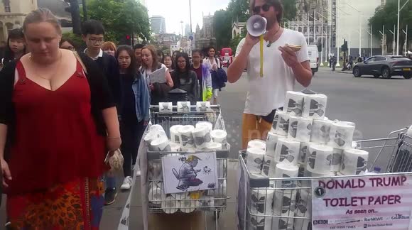UK protestors sell Donald Trump patterned toilet paper in central London