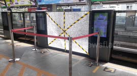Shattered glass at train station as multiple bomb explosions injure three in Bangkok