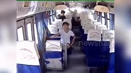 Chinese passenger breaks lower spine after being thrown into the air as coach drives over bumpy road