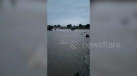 Driver's lucky escape as tractor turns turtle in central India floods