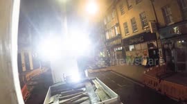 These pictures show the first new homes ever in Britain created - by craning pre-built houses into an existing building