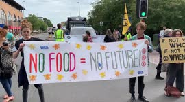 Extinction Rebellion protest group in Cambridge block East road in the city