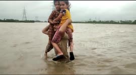 Policeman in India becomes viral sensation after carrying two children across 1.5 km river
