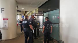 Part 2 man resisting arrest man Calls lapd 911 and says he has a gun in his backpack at laxpd
