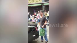 Simon Cowell gives £20 to beggar after Harrods shopping trip