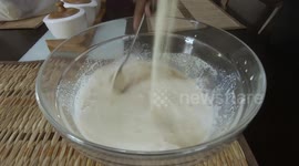 Preparation of cake mixing flour and ingredients to make a flour paste #2