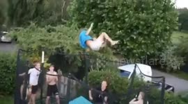 A daredevil teen rocketed into the air as he completed an astonishing six somersaults off a single bounce a trampoline - in his GARDEN
