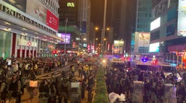 Hong Kong riot police block street