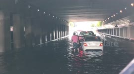 Cars get stalled in flash flooding