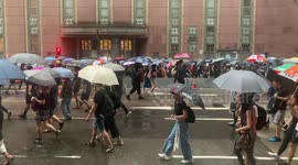 Hundreds of Hong Kong activists march in the street