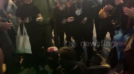 Hong Kong protester blows out laser 