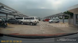 Filipino driver rams a car while making a routine parking manoeuvre