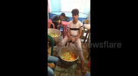 Teen Indian chef slices salad with lightning speed without injuring himself