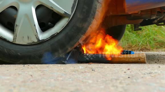 Incredible experiment as car tire takes on burning HOT axe