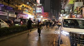Hong Kong Anti Extradition Protesters running from police in Tsuen Wan during clashes