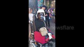 Disabled man enjoying the music at Notting Hill Carnival 2019