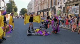 Breath-taking moment at Notting Hill Carnival 2019 when rollerskater jumped over wheelchair and two laying down