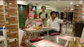 Robot waitress greets and serves customers at Indian restaurant